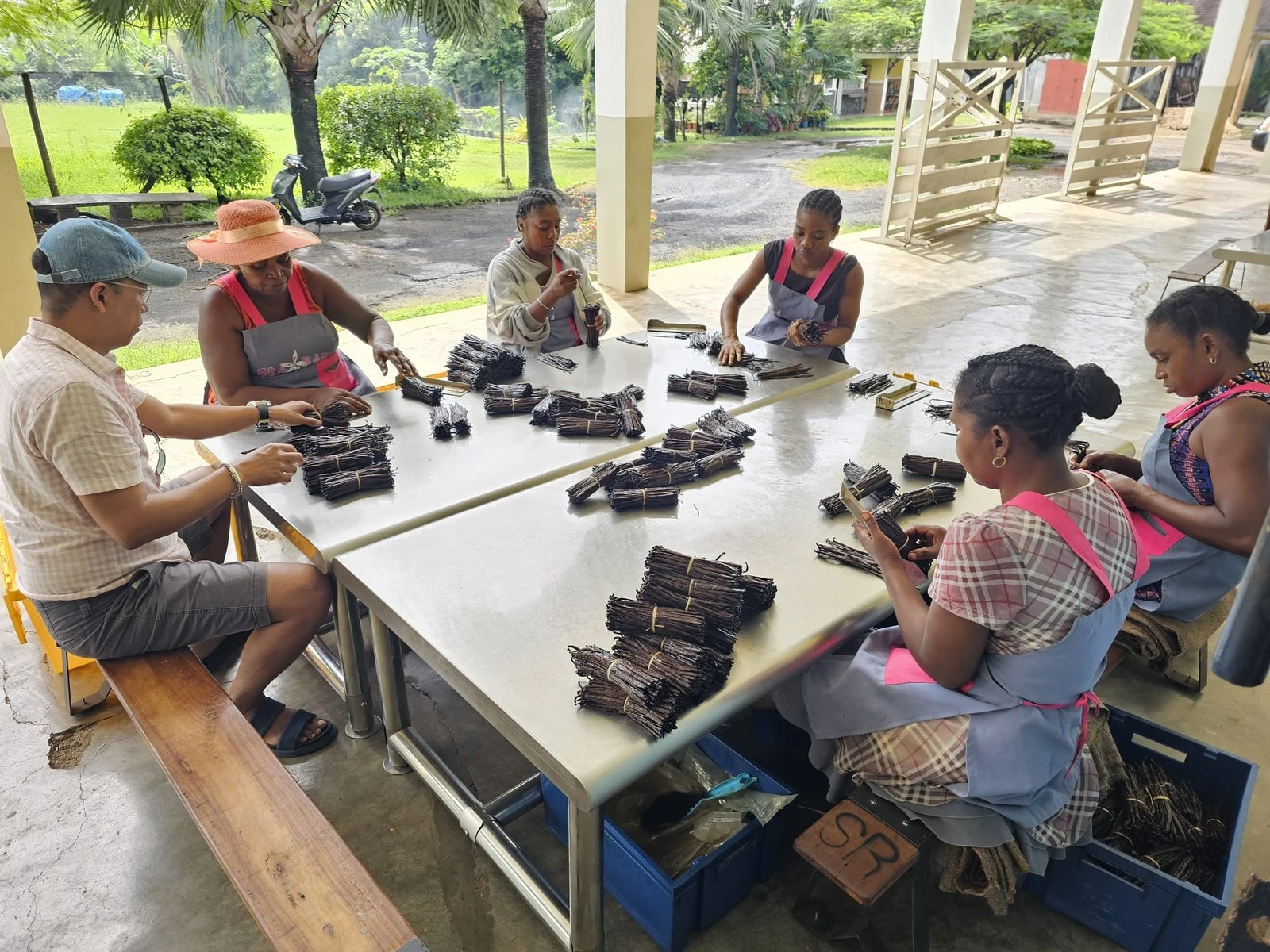 Collective preparation of beans in Madagascar’s supply chain